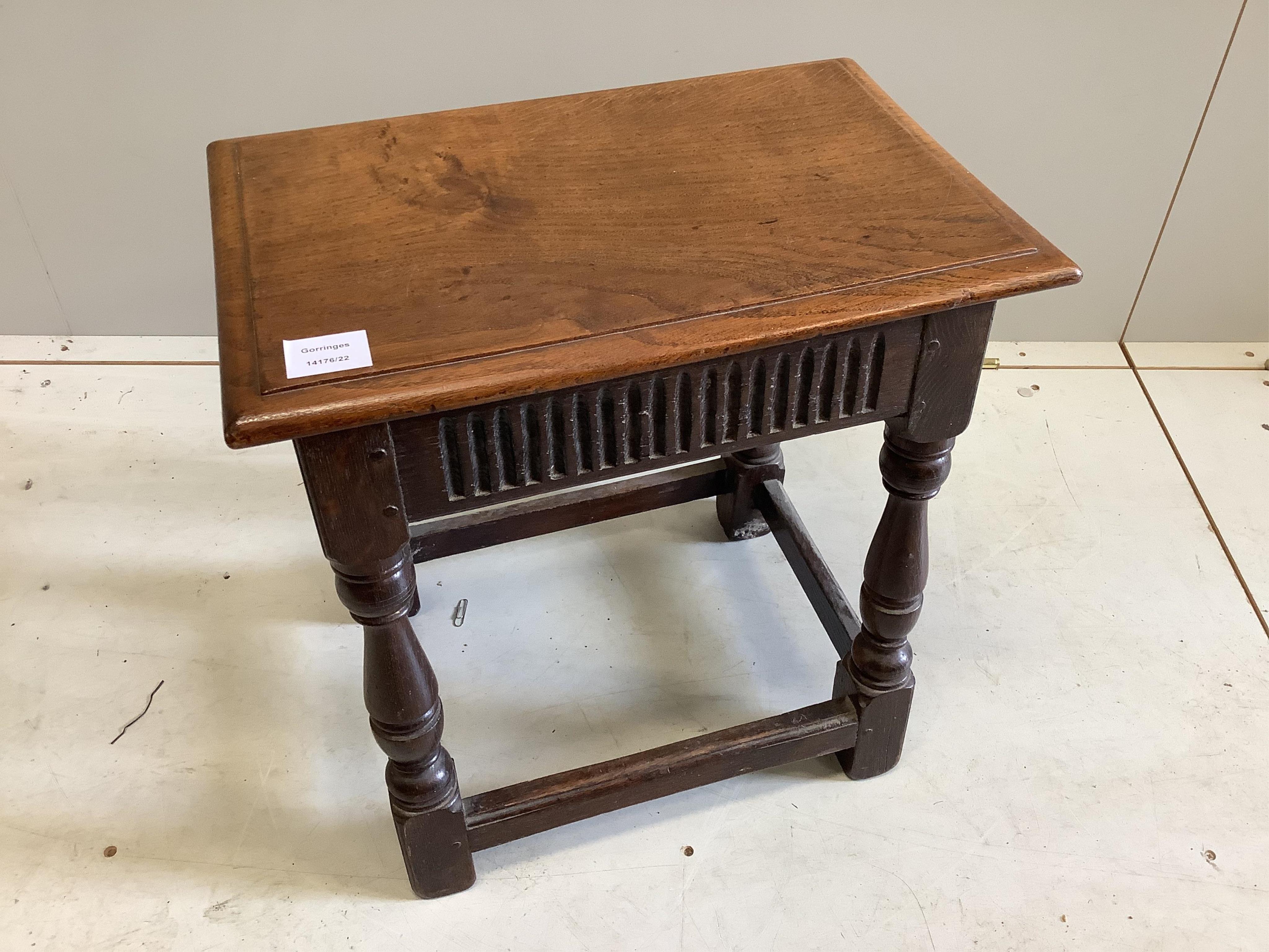 A 17th century style oak joint stool, width 46cm, depth 30cm, height 47cm. Condition - fair